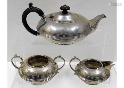 A 1920 three piece London silver tea set by Jay Ri