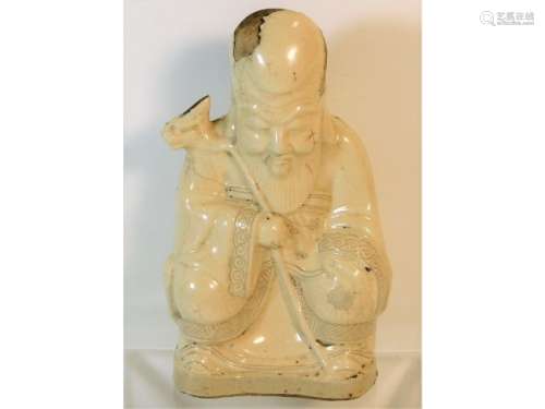 A 17th/18thC. Chinese stoneware Buddha type figure