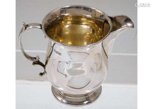 A gilt lined Sheffield silver creamer by John Roun