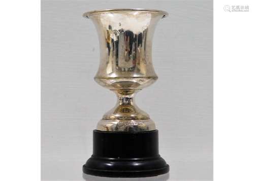 A silver trophy by W. J. Myatt & Co. with stand, s