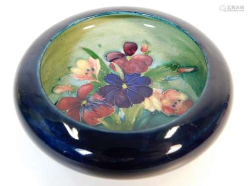 A vintage Moorcroft pottery dish with floral decor