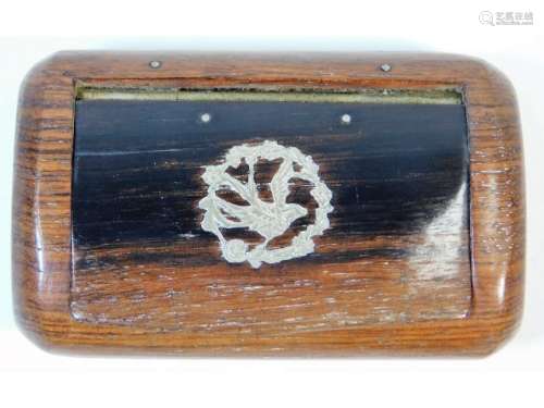 A rosewood snuff box with inlaid white metal decor