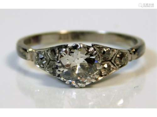 An antique 18ct white gold ring set with approx. 0.75ct old cut centre diamond (approx. 6mm x 4mm) o
