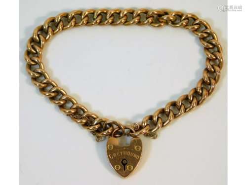 A 1918 Robert Pringle Chester 9ct gold curb bracelet with inscription to locket 