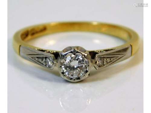 An antique 18ct gold ring with platinum set 0.25ct diamond, size L 1.9g