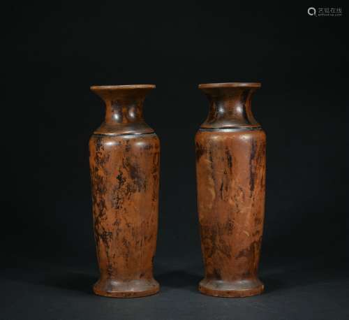 A pair of wood flower vase