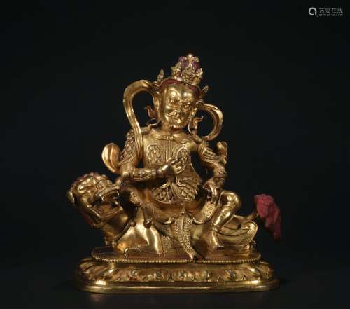 A gilt-bronze figure of vaishravana