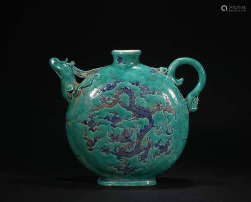 A green-ground and blue glazed 'dragon' pot