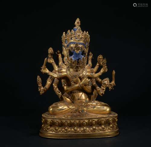 A gilt-bronze figure of Kalacakra