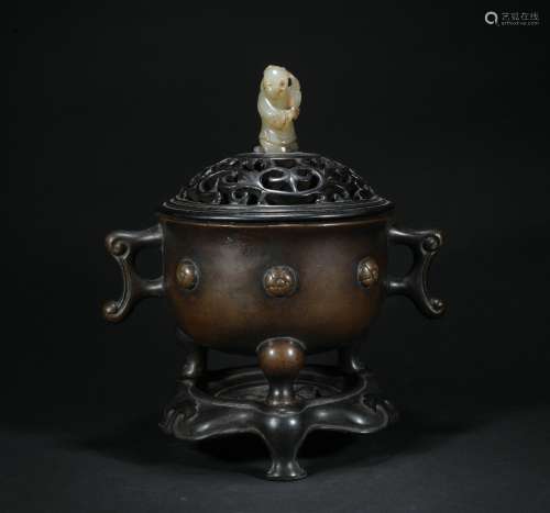 A bronze incense burner