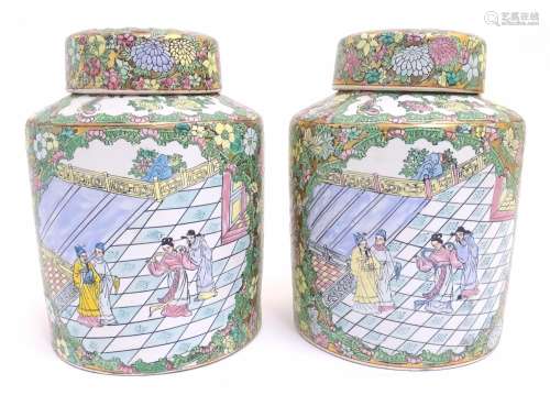 A pair of Chinese jars and covers profusely decorated with flowers and foliage, with two lobed
