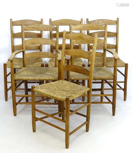 A set of six early / mid 20thC dining chairs with ash, oak and beech frames above envelope rush