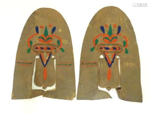 A pair of native American Indian leather moccasin shoe covers with embroidered decoration. Approx.