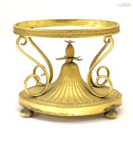 A c.1903 Elkington & Co. gilt metal oval centrepiece stand with scrolling decoration and central