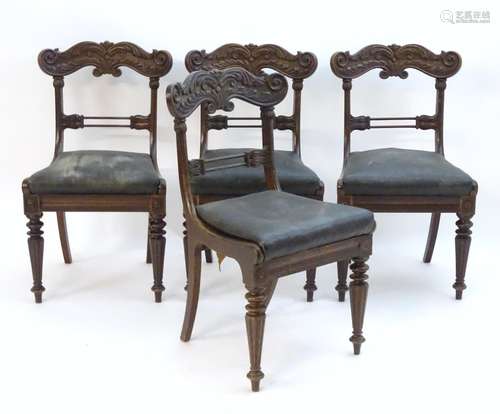 A set of four 19thC mahogany side chairs with heavily carved cresting rails and above foliate carved