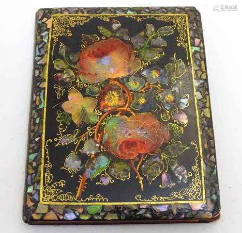 A Victorian papier mache aide de memoir case decorated with flowers, roses and foliage with inlaid