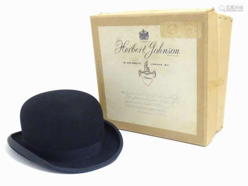 An early 20thC handmade fur felt bowler hat contained within original Herbert Johnson hatters box.