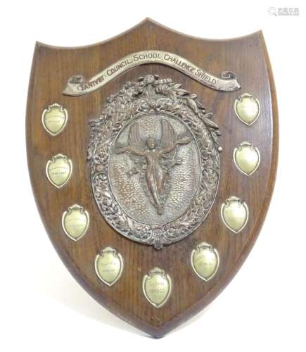 An early - mid 20thC trophy shield, of carved oak with silver plated mounts, inscribed Lanivet