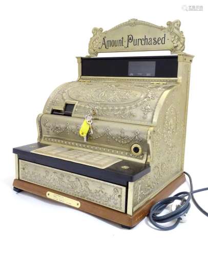 A late 20thC electric National Cash Register / till, model no. 2114-1708. Approx. 22