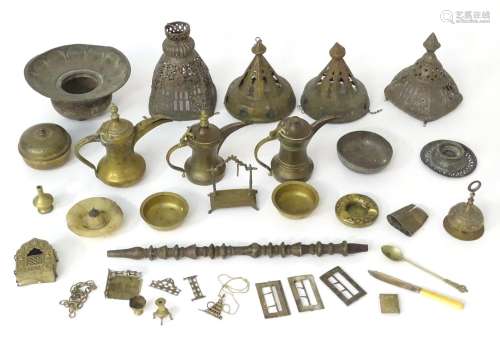 An assortment of Eastern metalware, including teapots, dishes, pendant lamp shades, various shisha