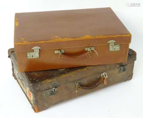 An early 20thC brown leather Gentleman's travelling suitcase, the interior with fitted sections, the