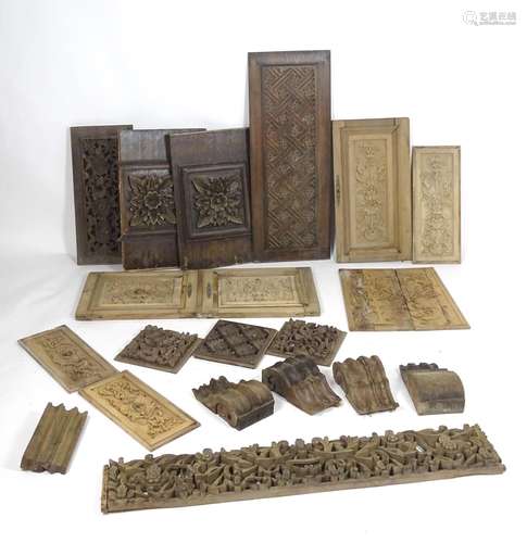 A collection of 18thC and later Continental carved wooden panels to include, carved wainscotting,