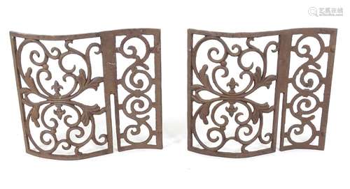 Two wrought iron architectural panels, of waved form, 16