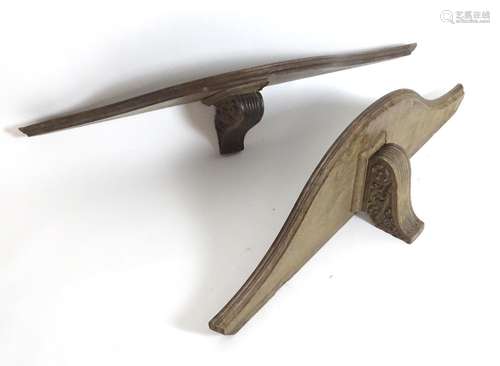 A pair of large 19thC oak wall brackets of serpentine form, each measuring 42