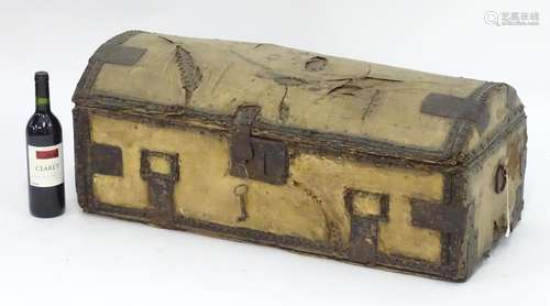 An 18thC trunk, pine with hide covering (marked 'WM'), domed lid, the interior lined with newspaper.