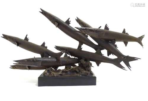 A 20thC limited edition bronze sculpture modelled as a shoal of barracuda fish. Signed Somchai and