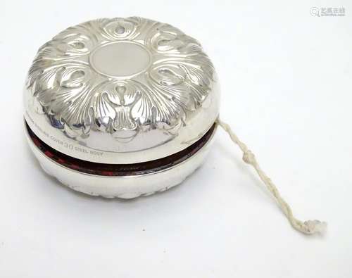 An American Yo-Yo marked Gorham Sterling cover. 2 1/2