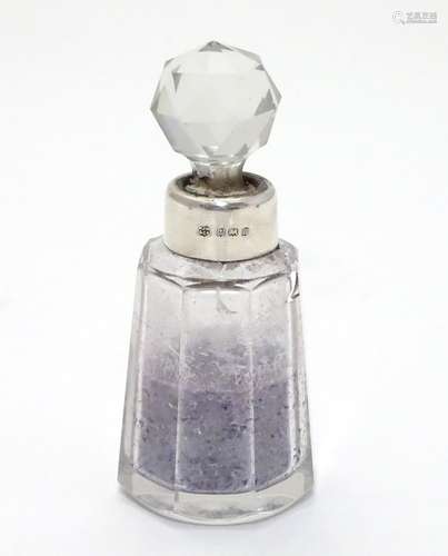 A cut glass scent bottle with silver collar hallmarked Birmingham 1932 maker W J Myatt & Co 3 1/4