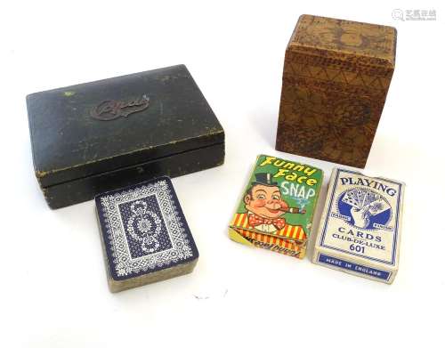 Toys: An early 20thC pokerwork double card box with floral decoration, containing a pack of Club
