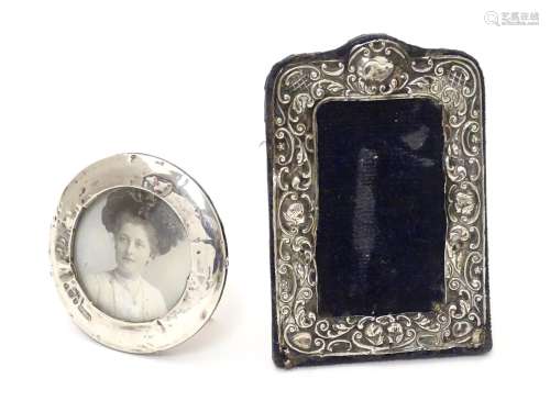 An easel back photograph frame with silver surround. Hallmarked Birmingham 1906. 4
