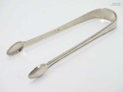 Scottish silver sugar tongs maker Mc. Possibly Matthew Craw / James McKenzie/ John McKenzie. c.1805.