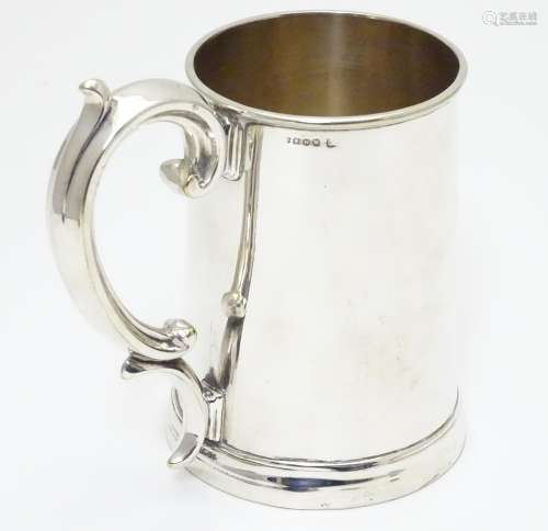A mid 19thC silver plated 1 pint tankard by Harrison of Sheffield. 5 1/2
