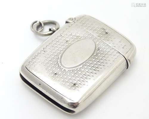 A Victorian silver vest case with engine turned decoration. hallmarked Birmingham 1891 maker