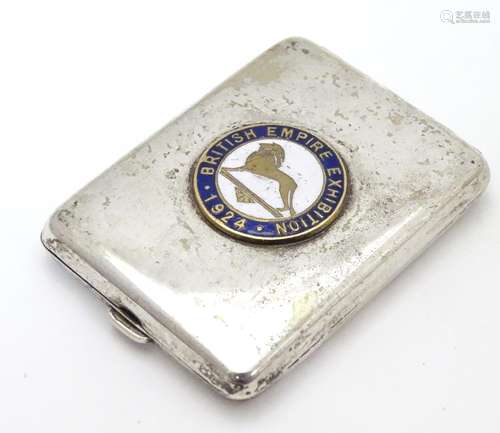 A silver plate match book case with enamel roundel to top ' British Empire Exhibition 1924' 2 1/4