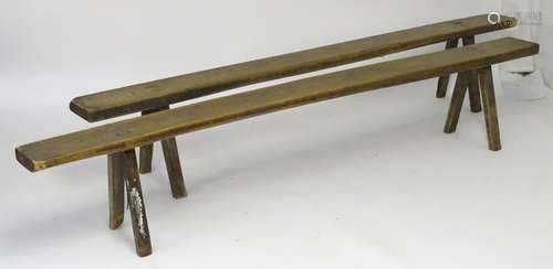 A pair of 18thC oak and elm benches. Measuring 94