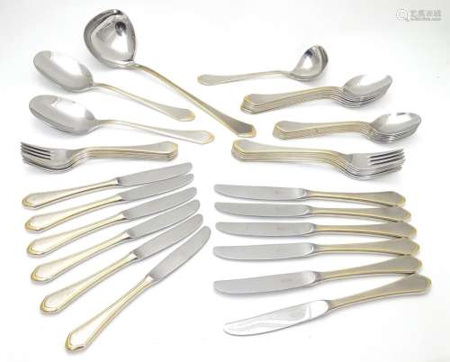 A six place set of German Furst Furosil stainless cutlery with gilt-edge accent comprising 6 table