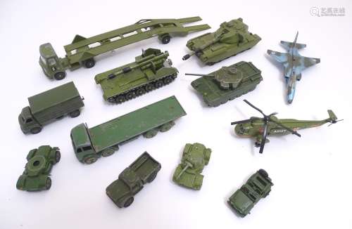 Toys: A quantity of Dinky Toys die cast scale model military vehicles comprising AEC Articulated