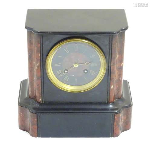 A Victorian slate cased mantle clock with 8-day movement string on a bell. 8 3/4