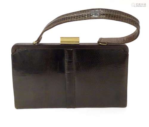 A snakeskin leather bag by Mappin & Webb Ltd along with a matching Patrys compact (2) Please