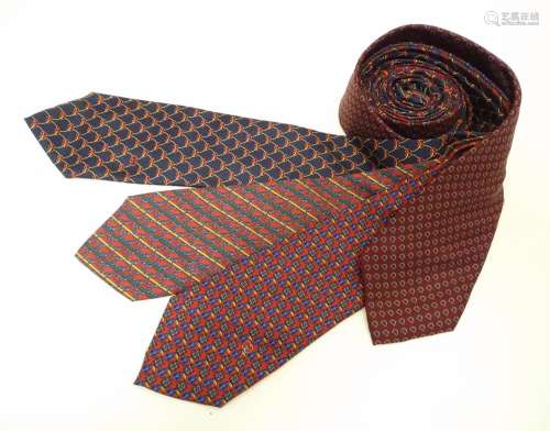 4 Gucci silk ties, in various designs of reds and blues (4) Please Note - we do not make reference