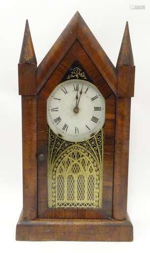 An American mantle clock with glazed door and having paper trade label to interior for 'Jerome & Co.