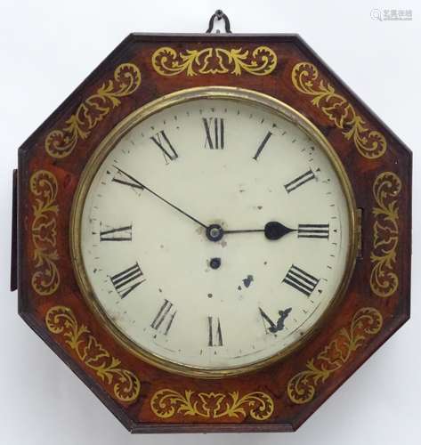 A Regency wall clock, the octagonal shaped rosewood case with inlaid brass detail and having a fusee