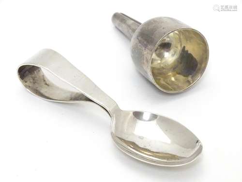 A child's silver spoon hallmarked Birmingham 1926 maker James Swann & Son. Together with a silver