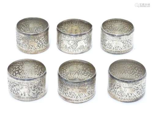 A set of 6 Indian white metal napkin rings with elephant decoration. Please Note - we do not make