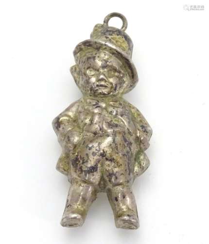 A novelty silver plate rattle formed as a young child 2 1/4