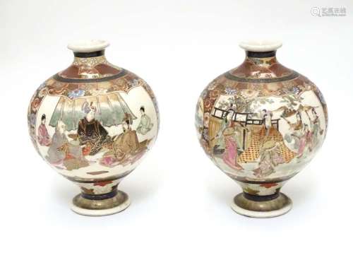 A pair of Japanese Satsuma vases of globular form in the Kutani style with flared rims and feet. The